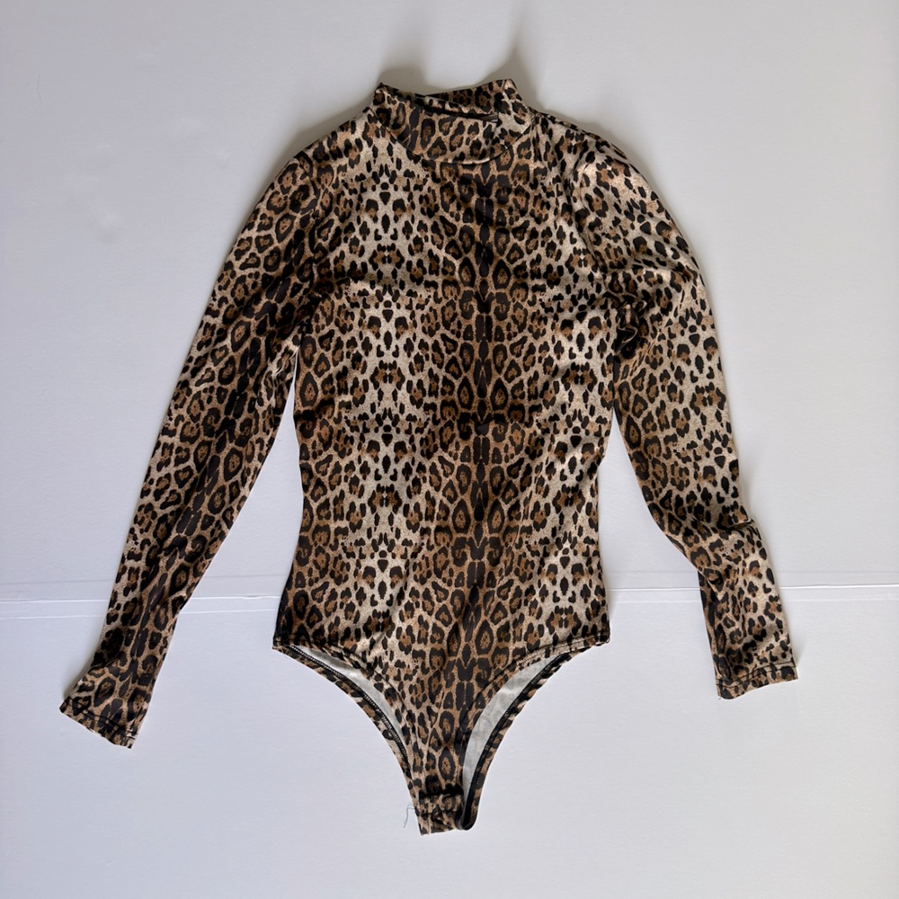 Leopard print open back body suit